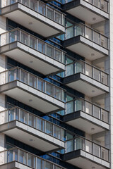 View on modern high-rise flats with  roof balconies 