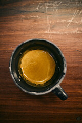 Espresso cup on wood background