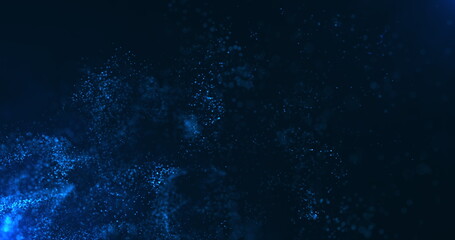 A vortex of blue particles slowly unfolding against a dark blue background. Bokeh particles. Water...