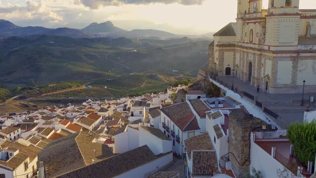 Panoramic view of the impressive white village of Olvera with its hilltop cathedral, Cadiz.