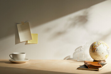 light wooden desk at morning with window light. copy space