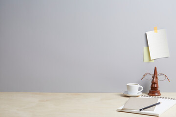modern desk with various office supplies, front view and copy space.