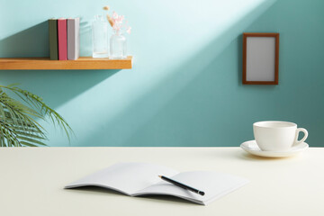 front view of pastel color desk table with offie supplies and cyan background. copy space