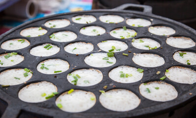 coconut rice cake on hot pan