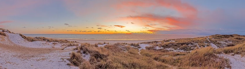 Fototapeten Panorama over the beach of the Danish coastal resort of Blavand at sunset © Aquarius