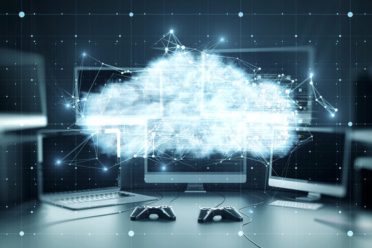 Close up of various computer monitors on desktop with digital glowing polygonal cloud mesh on blurry background. Storage technology concepts transfer data to cloud computing platforms.