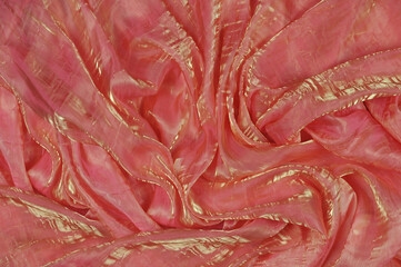 Pink silk chiffon textured fabric with gold shimmer. Pink with gold  gradient shiny silk chiffon...