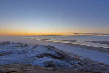 Panorama over the beach of the Danish coastal resort of Blavand at sunrise