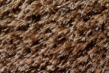 Close-up shot of the fur of the brown textile