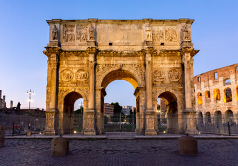 Fototapeta na wymiar Arch of Constantine (Arco di Constantino) near Colosseum (Coliseum) at sunset, Rome, Italy