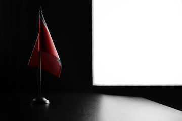 Small national flag of the Trinidad and Tobago on a black background