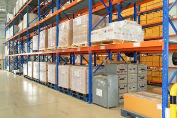 Interior of large warehouse retail store industry. Rack of furniture and home accessories stock storage. Interior of cargo in ecommerce and logistic concept. Depot
