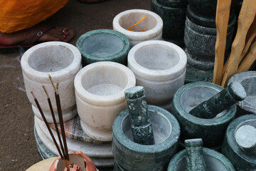 Marble mortars are sold on the street in Puri, Odisha, India.