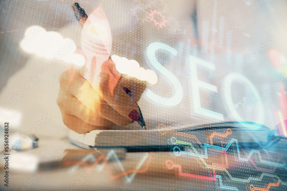 Poster double exposure of woman's hands making notes with seo icon. concept of search engine optimization