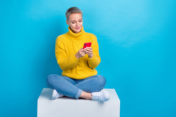 Full length photo of short blonde hair girl wear yellow knit jumper browsing ebay new cheap...