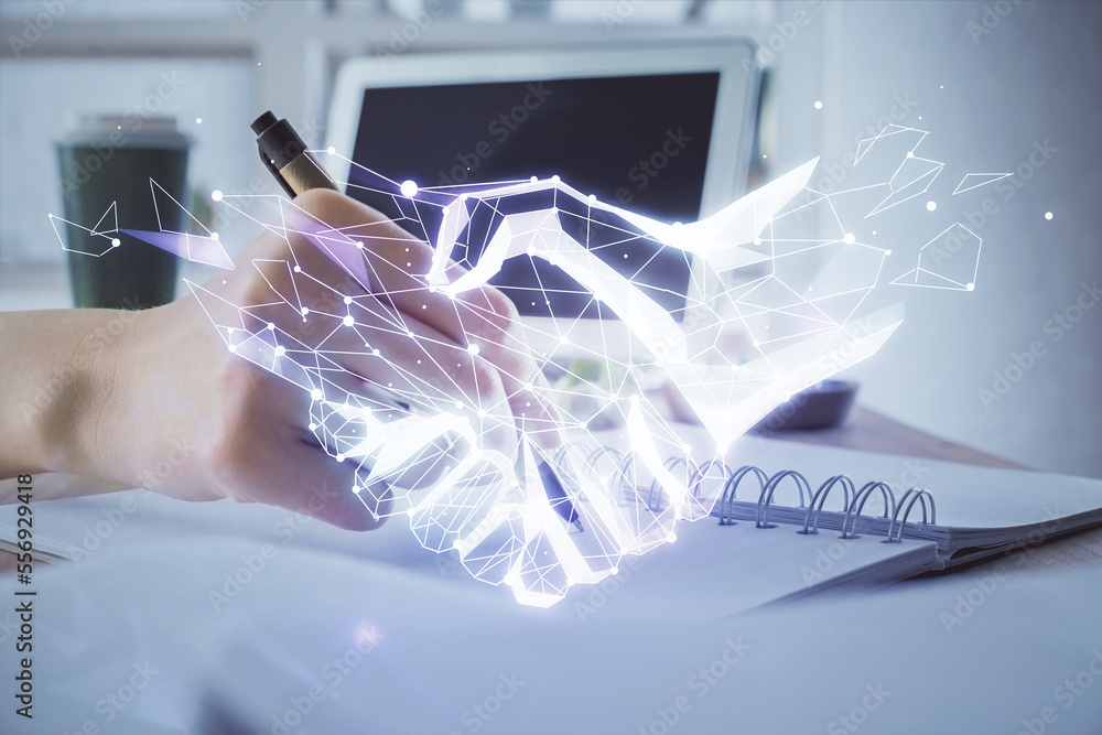 Poster handshake drawing over hands taking notes background. concept of success. double exposure