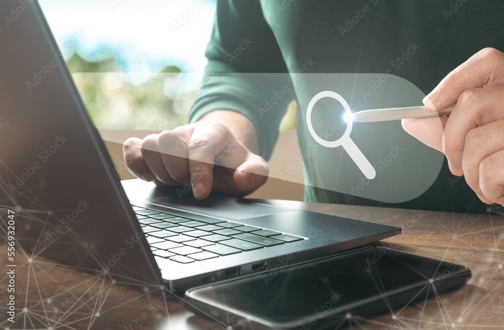 Poster searching browsing internet data information with blank search bar. hand of businessman working with