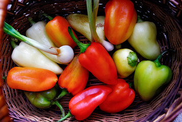 fresh vegetables in a wooden basket, pepper, spring onion, basket with vegetables 