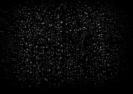 Black wet background, Raindrops for overlaying on window. Royalty high-quality free stock photo image of Drops of water flow overlay down the surface of black glass background. Texture for creativity