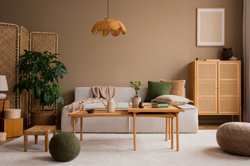 Interior design of living room with modular  sofa, wooden coffee table, rattan sideboard, green...