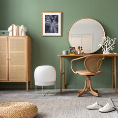 Stylish composition of bedroom in modern glamour interior design with vanity table, big rounded mirror, tropical bed and beautiful personal accessories. Mock up poster. Template..