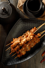 Chicken grilled satay skewers. Asian thai style food.