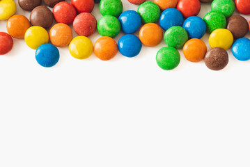 Colorful chocolate candies isolated on white background