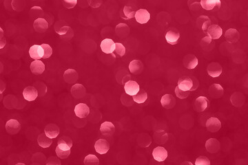 Viva Magenta background with blurry sparkles.