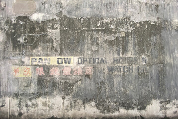 Urban decay - Old gray wall with advertisement texture