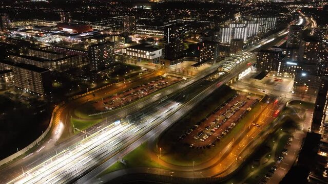 Hyperlapse time lapse of busy intersection infrastructure in Amsterdam metroline Noord Zuid lijn. Road towards Amsterdam center, Ij tunnel metrostation North.