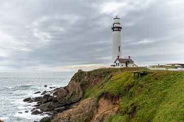 Fototapeta na wymiar Pigeon Point Light Station or Pigeon Point Lighthouse is a lighthouse built in 1871 to guide ships on the Pacific coast of California. It is the tallest lighthouse on the West Coast of the US