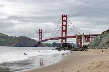 Photo sur Plexiglas Plage de Baker, San Francisco Golden Gate Bridge in San Francisco, California. The Golden Gate Bridge is a suspension bridge spanning the Golden Gate. Baker Beach in Background. USA