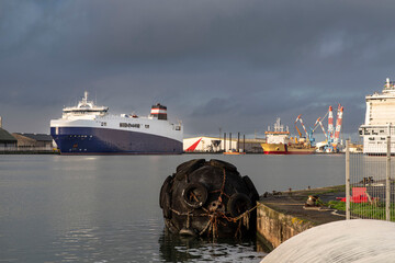 Cargo ship on the quay of a port of Saint-Nazaire in France