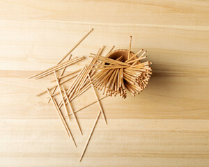 Wooden Toothpicks on Wood Background with Copy Space, Flat Lay Tooth Picks, Toothpicks Top View Mockup