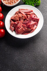 fresh chicken liver raw offal meal food snack on the table copy space food background rustic top view