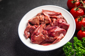 fresh chicken liver raw offal meal food snack on the table copy space food background rustic top view