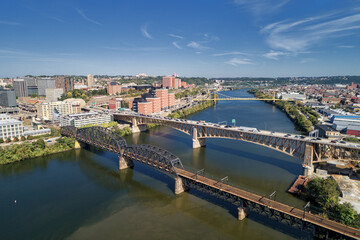 Fototapeta na wymiar Pittsburgh Skyline with Downtown and Business District. Train Bridge and Liberty Bridge