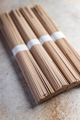 soba buckwheat noodles raw Asian snack meal food snack on the table copy space food background rustic top view