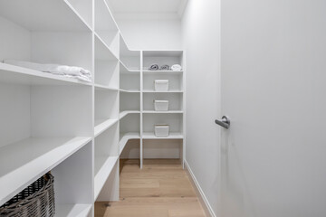 new modern white walk in  stylish pantry shelving and cabinetry