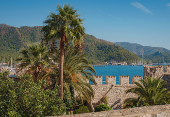 Fototapeta na wymiar Marmaris is resort town on Turkish Riviera, also known as Turquoise Coast. Marmaris is great place for sailing and diving. Castle is heart of old town