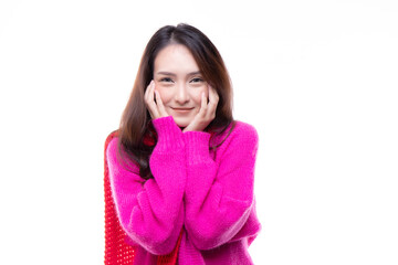 Fall and winter fashion concept. Charming beautiful young woman happy smiling brunette, woman wearing knitted pink sweater and red scarf isolated on white background.