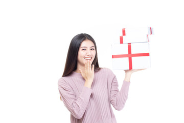 Attractive asian woman holding gift box in christmas, new year, valentine day, birthday celebration concept. Portrait of smiling happy pretty girl hold gift box isolated on white with copy space.