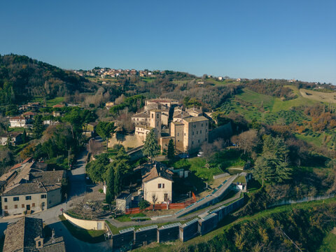 Italy, December 2022: aerial view of the beautiful medieval village of Montegridolfo in the province of Rimini in the Emilia Romagna region bordering the Marche region