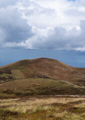 Cloudy view of the Pentland Hills in Scotland. Nature on a cold day