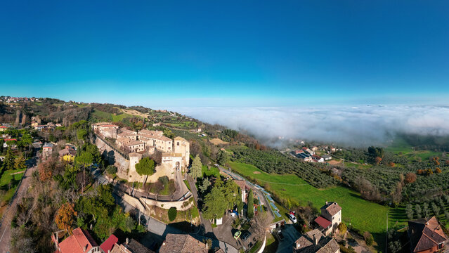 Italy, December 2022: aerial view of the beautiful medieval village of Montegridolfo in the province of Rimini in the Emilia Romagna region bordering the Marche region
