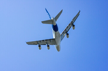 MAKS-2011 on territory of airfield LII im. Gromov. French passenger four-engine wide-body aircraft Airbus A-380 performs demonstration flight in front of audience. Zhukovsky, Russia - August 16, 2011