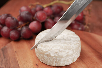 close up of fresh cheese on white background.