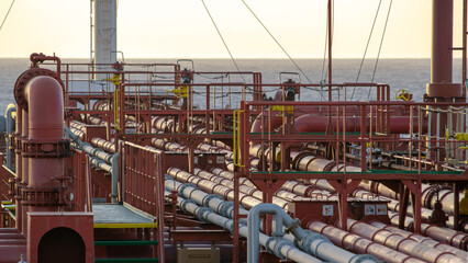 Pipe line with crane on main deck oil tanker