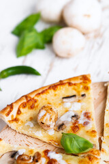 Tasty fresh baked pizza with champignons and chicken fillet