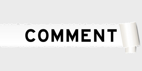 Ripped gray paper background that have word comment under torn part